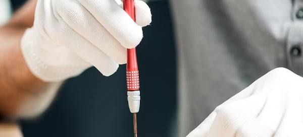 Apple technician fixing iPhone