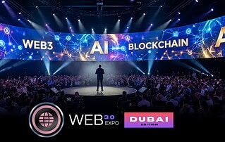 Large audience attending AI, Web3, blockchain, and Web3.0 Expo Dubai with a digital stage displaying interconnected technology icons and futuristic graphics emphasizing AI, blockchain, and Web3 innovations.